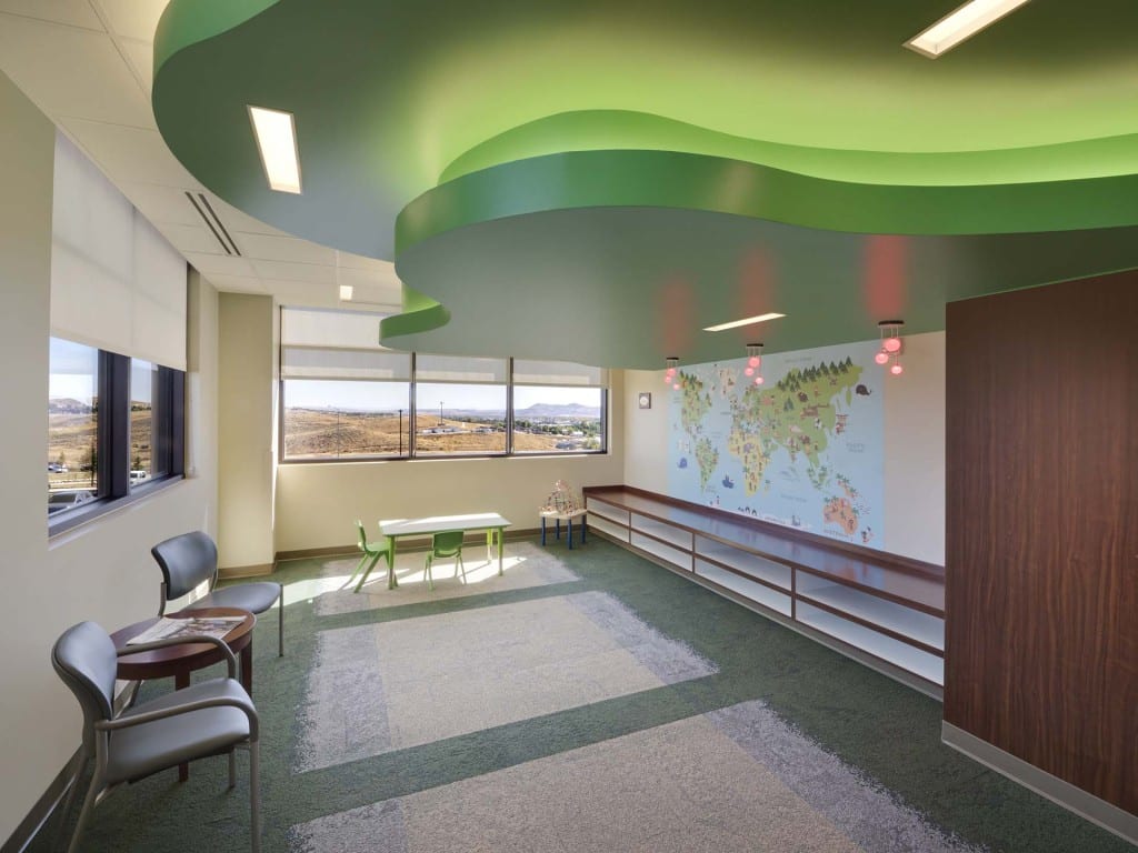 Childrens play area and decorative mural in waiting room