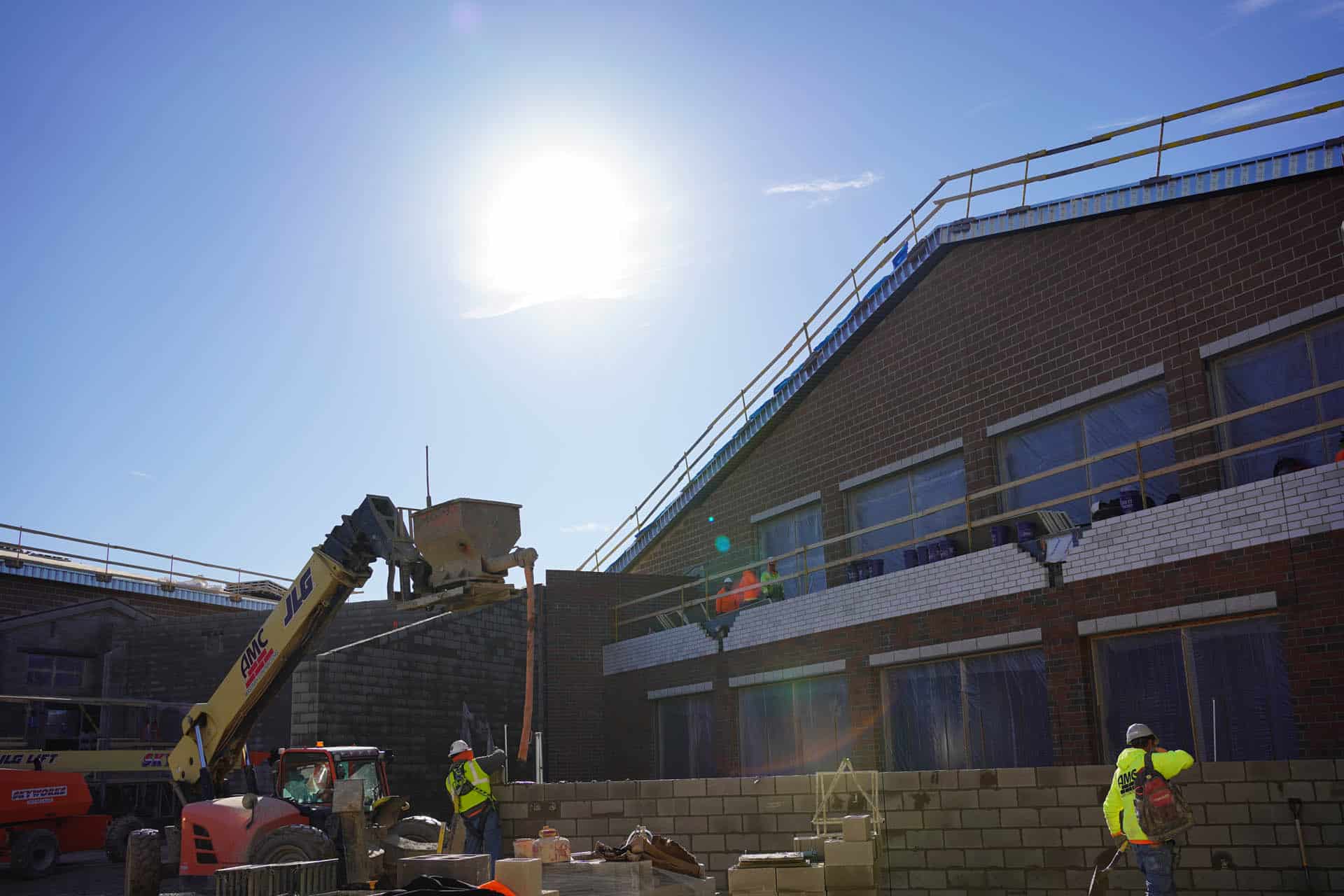 Men laying cement bricks
