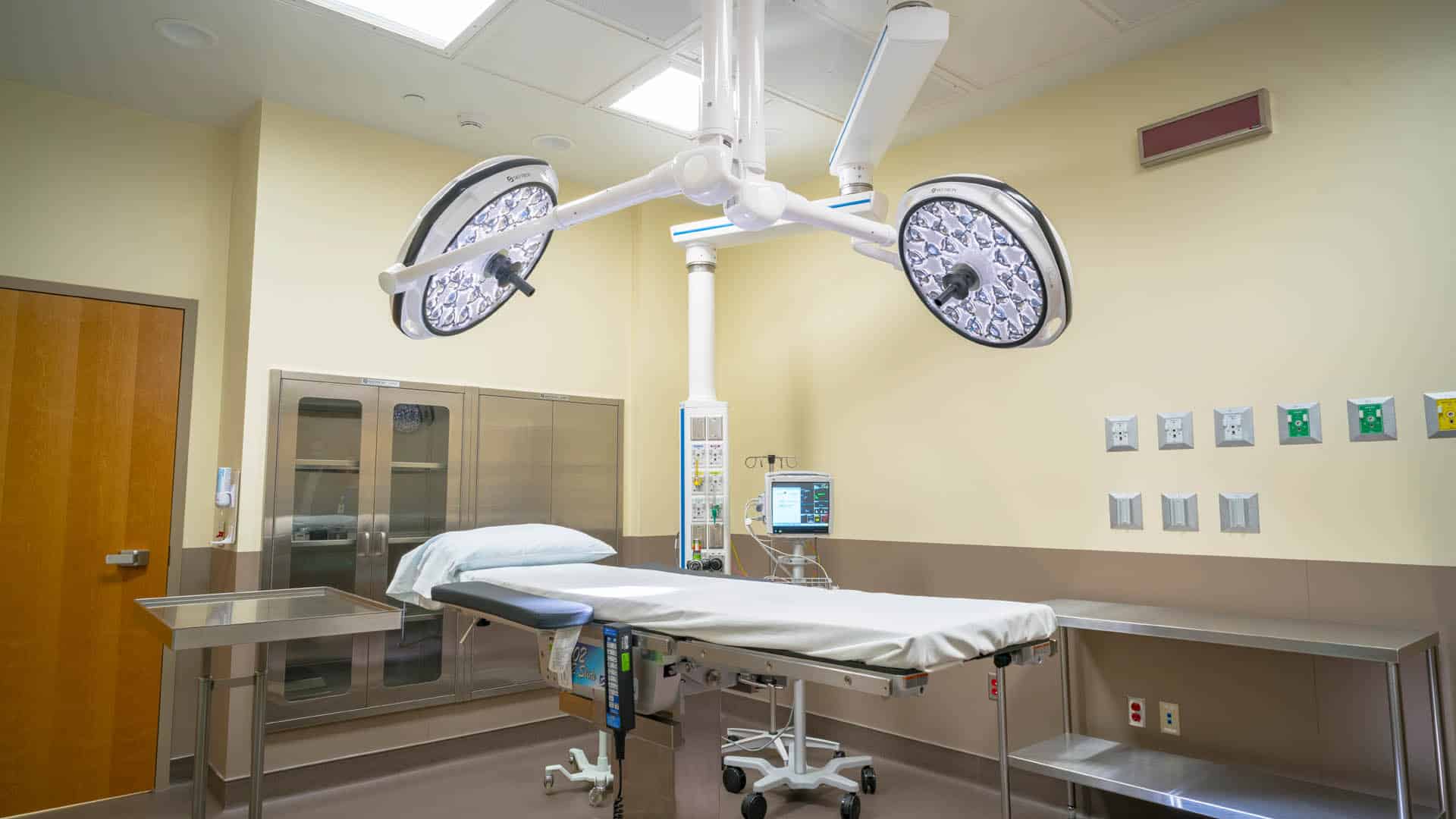 Operating room with large surgical lights