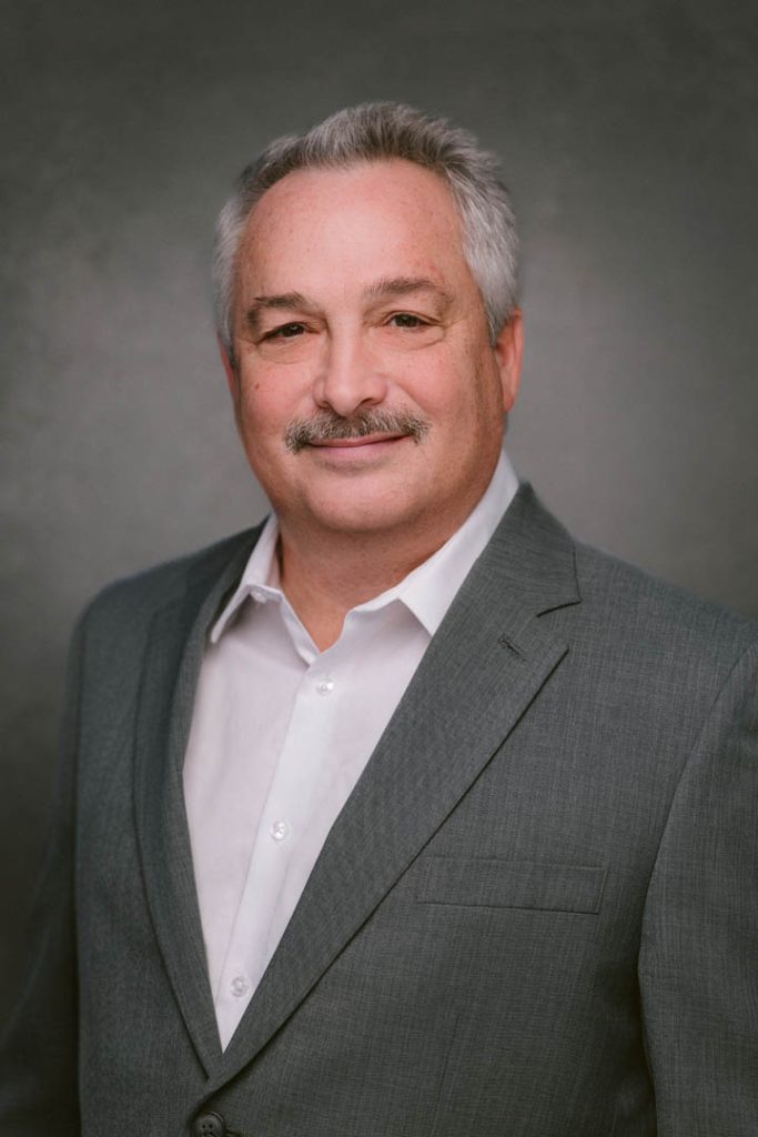 Head shot of Dwight Farmer.